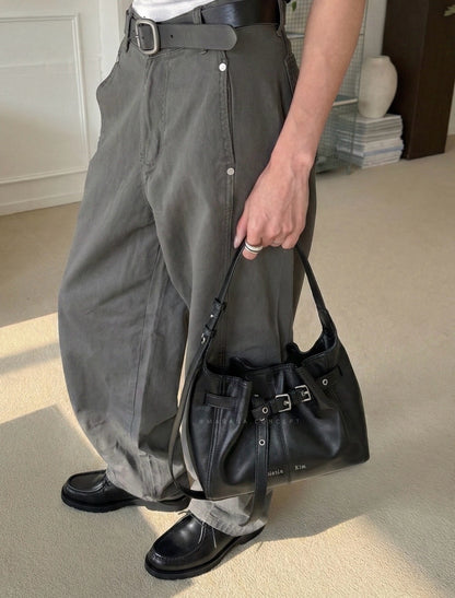 MATIN KIM BELTED VOLUNN BUCKET BAG