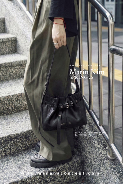 MATIN KIM BELTED VOLUNN BUCKET BAG