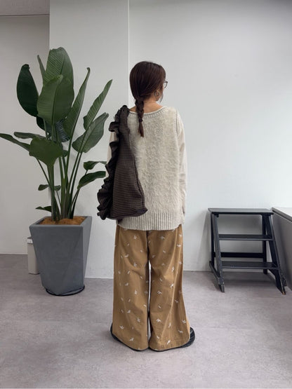 TYNNE. FRILL TRIANGLE BAG