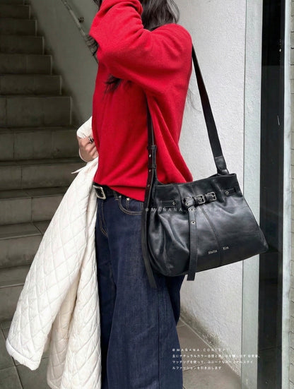 MATIN KIM BELTED VOLUNN BUCKET BAG