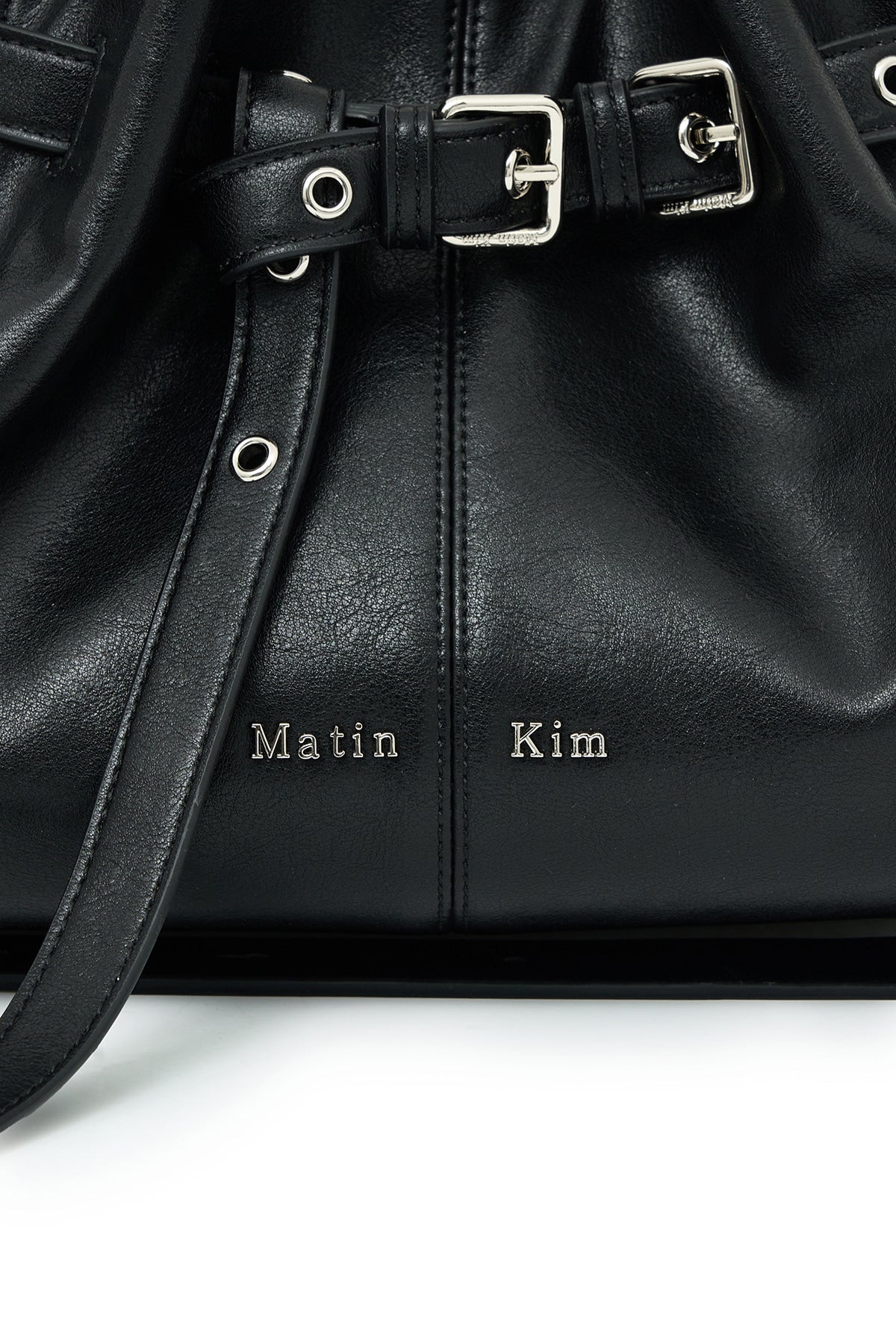 MATIN KIM BELTED VOLUNN BUCKET BAG