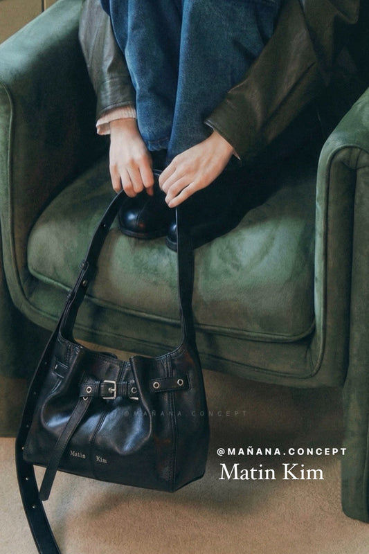 MATIN KIM BELTED VOLUNN BUCKET BAG