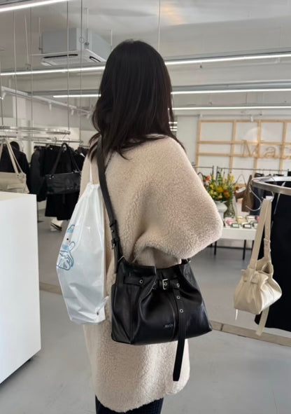 MATIN KIM BELTED VOLUNN BUCKET BAG
