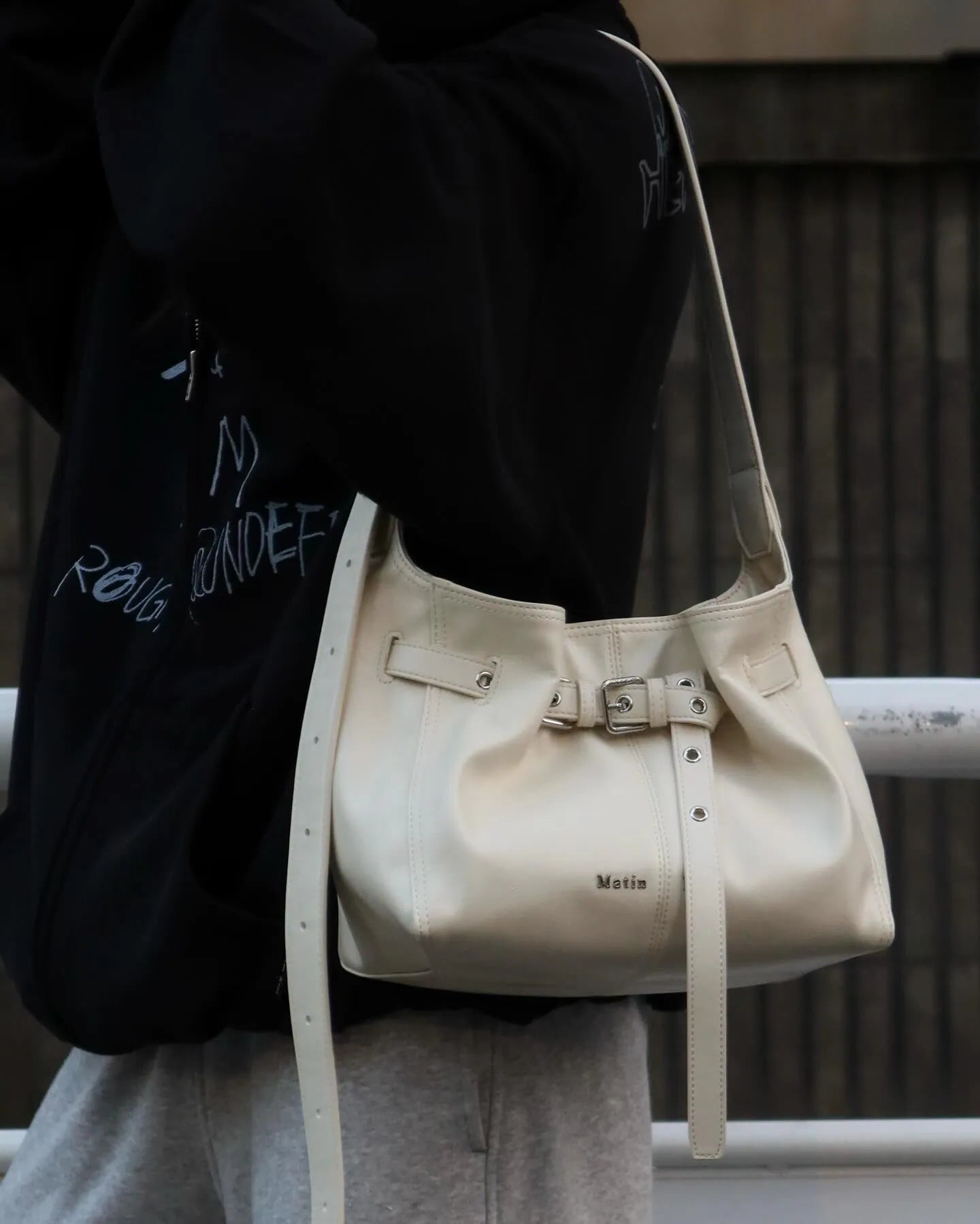 MATIN KIM BELTED VOLUNN BUCKET BAG