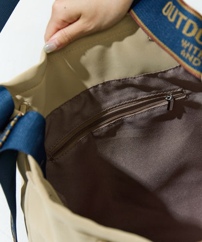 NA467 OUTDOOR PRODUCTS - SUEDE LOGO TAPE BAG