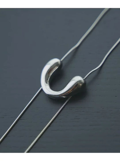 NA436 MOTIF LOOP TIE NECKLACE