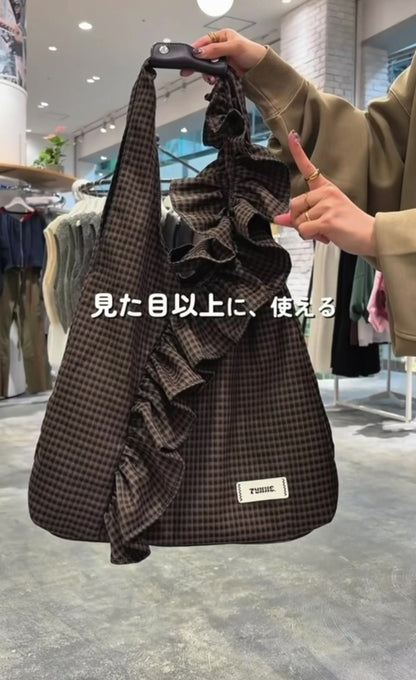TYNNE. FRILL TRIANGLE BAG
